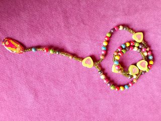 Camandula de cuentas y colgante