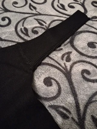 Jersey negro con flecos talla única