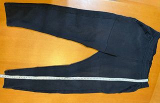 Pantalón Nike Azul con agujero en bolsillo