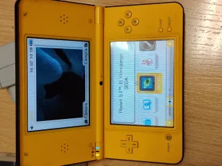 Nintendo DSi XL Amarilla + 3 Juegos y Cargador