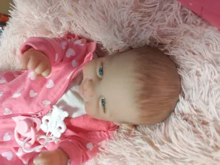 Preciosa Reborn sonriente