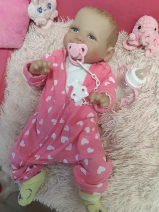 Preciosa Reborn sonriente