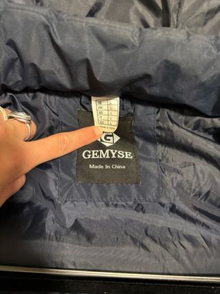 Piumino blu con cappuccio e pelliccia