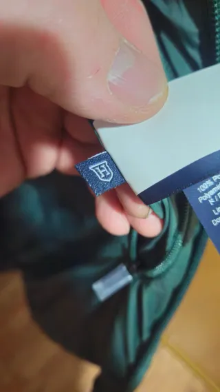 Chaqueta de plumas verde en perfectas estado