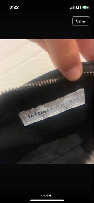 Bolso negro con cadena