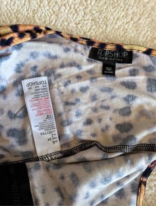 Body estampado leopardo con cremallera