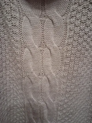 Jersey lana cuello alto oversize beige