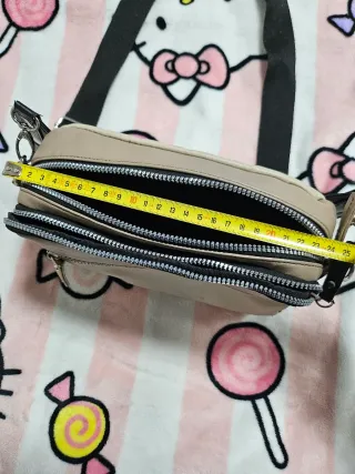 Bolso bandolera beige y negro