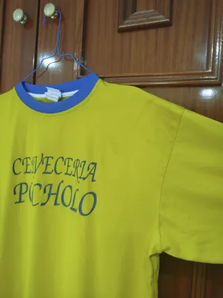 Camiseta Joma Amarilla con Cuello Azul