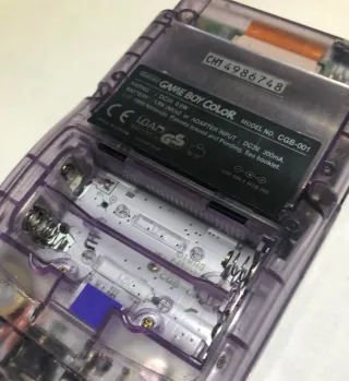 Game Boy Color morada Transparente con caja