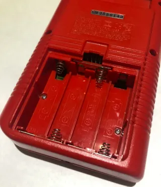 Lote Game Boy Rojo + Charizard Carta y Juego