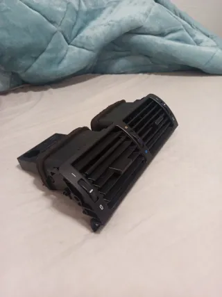 Posavasos en rejilla aire BMW E46