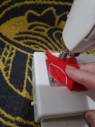 Máquina de coser de juguete