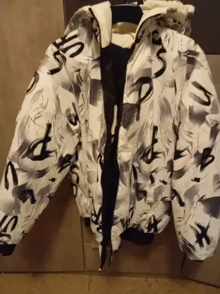 Chaqueta acolchada negra y blanca Talla L