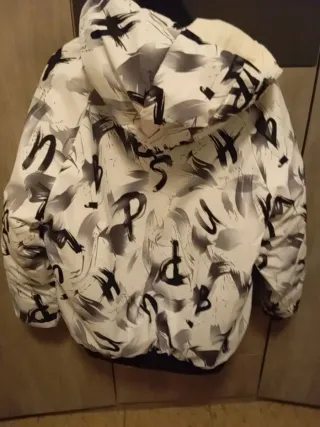 Chaqueta acolchada negra y blanca Talla L