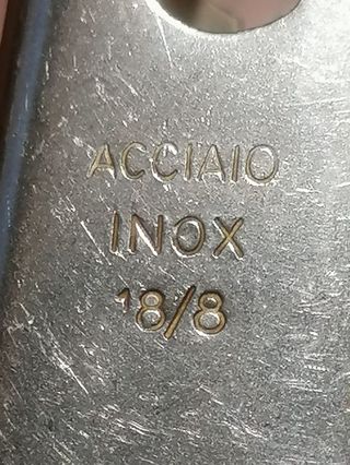 Passaverdure vintage acciaio con pomello rosso