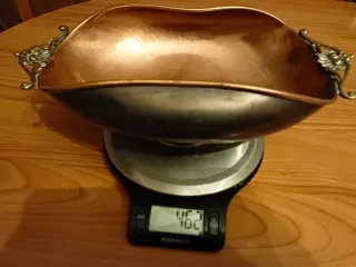 Antico svuotatasche in rame