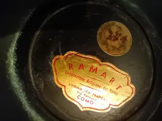 Antico svuotatasche in rame