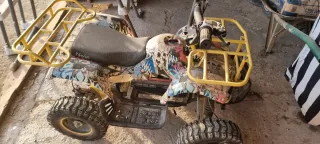 Se vende Quad infantil amarillo
