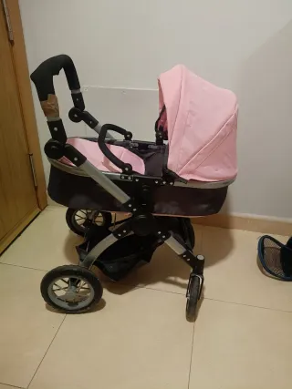 Carrito de muñecas rosa