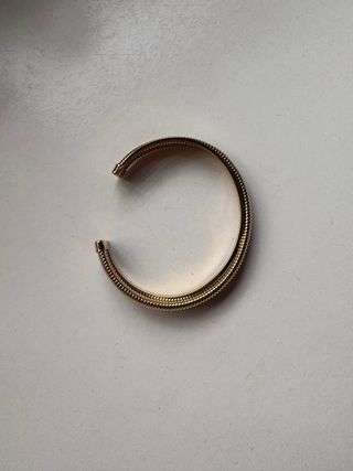 Pulsera rígida malla dorada