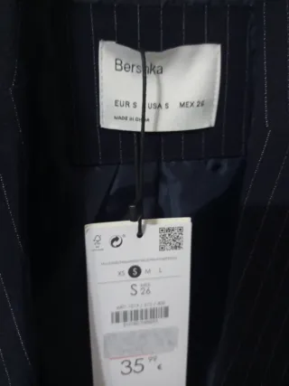 Chaqueta de traje azul con rayas