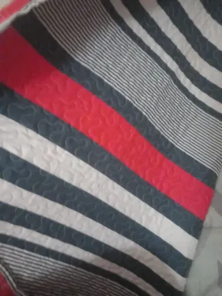 Edredón reversible.