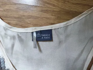 Top de lentejuelas Urban Outfitters