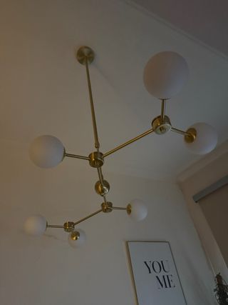 Lámpara Westwing dorada y transparente