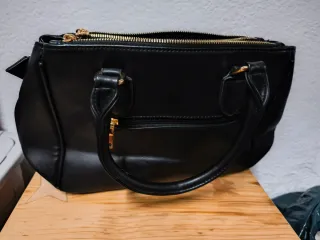 Bolso de mano negro para mujer