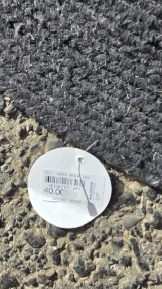 Alfombra redonda de yute beige y negro