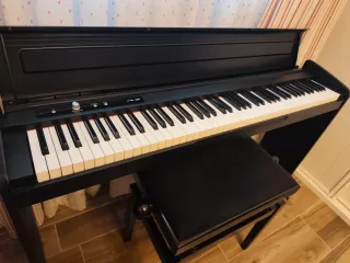 Piano Digital Korg LP-180 más banqueta profesional