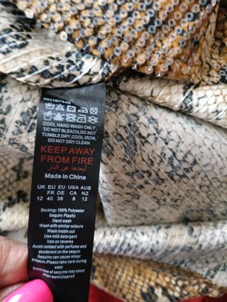 Falda larga lentejuelas animal print M