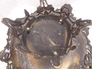 Centro de mesa de bronce ornamentado