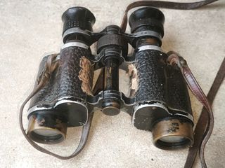 Prismáticos antiguos con estuche de cuero