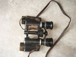 Prismáticos antiguos con estuche de cuero