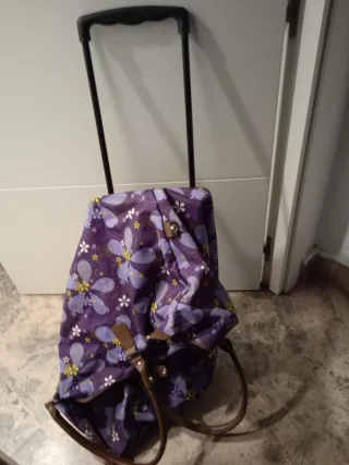 Bolso de viaje con ruedas morado