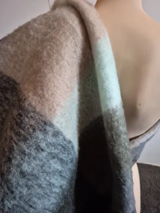 Grandes bufandas unisex a precio pequeño.