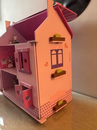 Casa de muñecas rosa