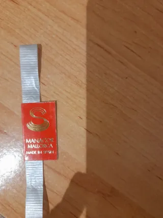 Collar de perlas con broche dorado