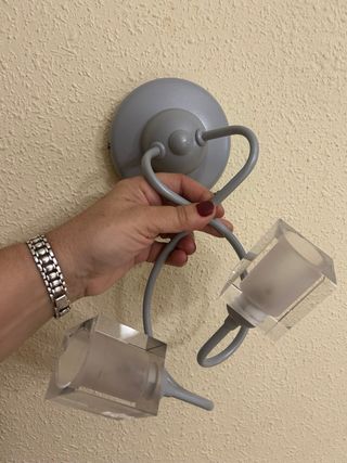 Apliques Fordecor de pared cristal y metal gris.