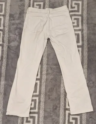 Pantalón estilo campana marca Mango Talla S/36