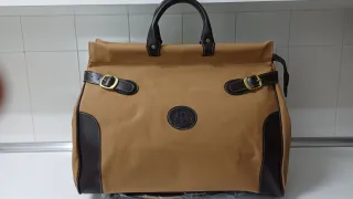 Bolsa de viaje y neceser mostaza y marrón