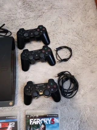 Console PlayStation 3 con 3 controller e giochi
