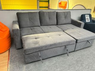 Sofá cama gris con arcón