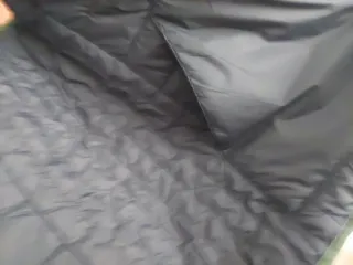 Chaleco acolchado verde y azul