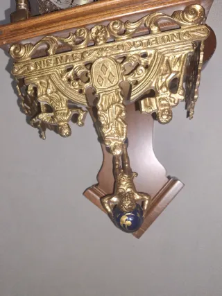 Reloj de pared antiguo dorado