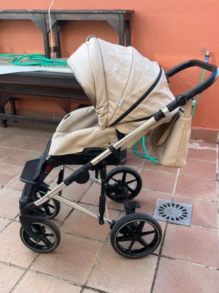 Carro de bebé beige