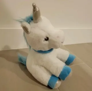 Peluche unicornio blanco y azul