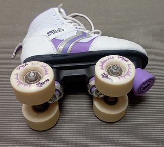 Patines de 4 ruedas blancos y morados